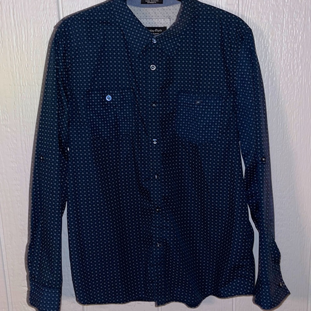 Blue polka dot long sleeve dressing shirt.